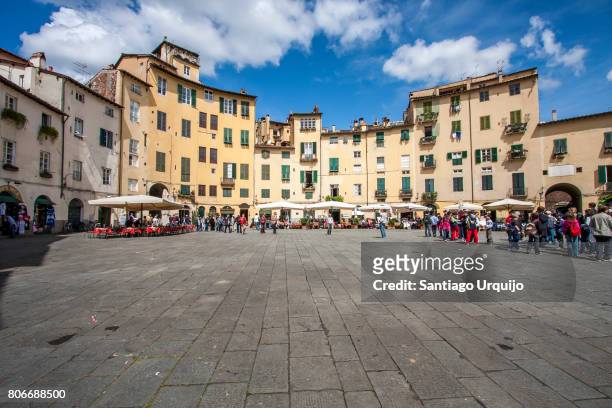 piazza anfiteatro in lucca - lucca italy stock pictures, royalty-free photos & images