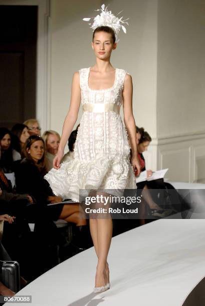 Model walks the runway during the Oscar de la Rental Bridal Collection show at Park Avenue Armory on April 14, 2008 in New York City.