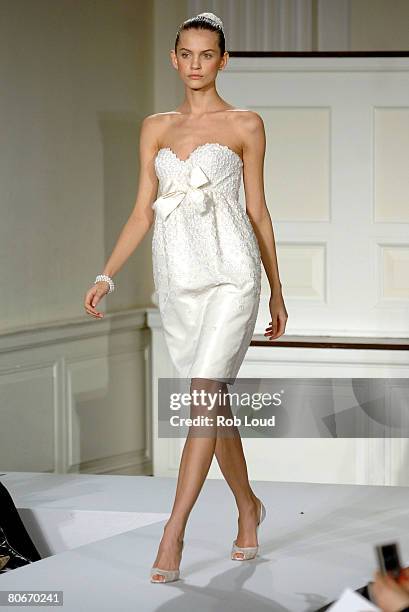 Model walks the runway during the Oscar de la Rental Bridal Collection show at Park Avenue Armory on April 14, 2008 in New York City.