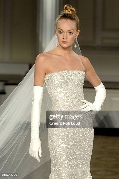 Model walks the runway during the Oscar de la Rental Bridal Collection show at Park Avenue Armory on April 14, 2008 in New York City.