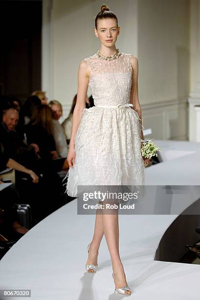 Model walks the runway during the Oscar de la Rental Bridal Collection show at Park Avenue Armory on April 14, 2008 in New York City.