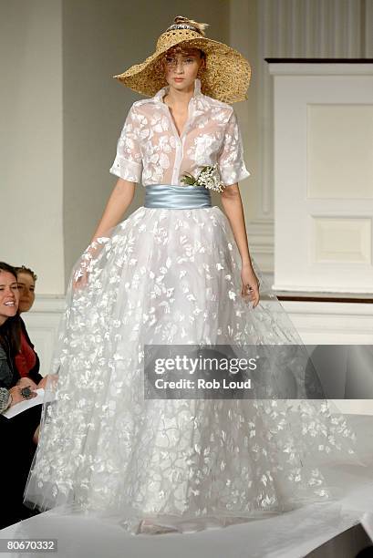 Model walks the runway during the Oscar de la Rental Bridal Collection show at Park Avenue Armory on April 14, 2008 in New York City.