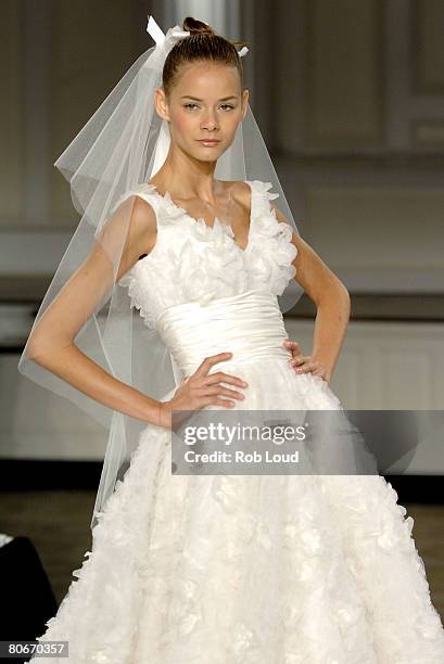 Model walks the runway during the Oscar de la Rental Bridal Collection show at Park Avenue Armory on April 14, 2008 in New York City.