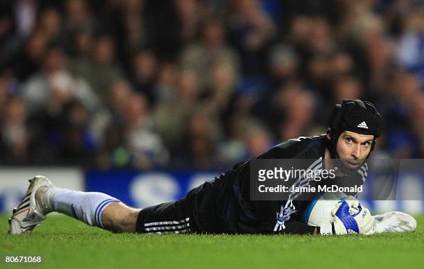 Petr Cech of Chelsea wears a protective face guard during the Barclays Premier League match between Chelsea and Wigan Athletic at Stamford Bridge on...