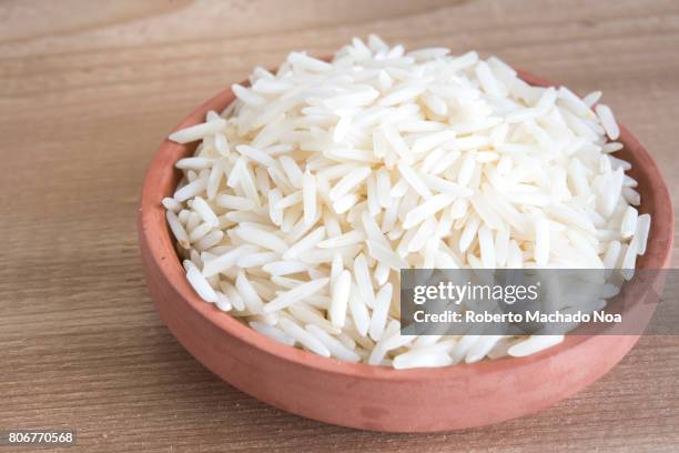 rice grains, cereal. white rice, ingredient close up. raw food close up - white rice stock pictures, royalty-free photos & images