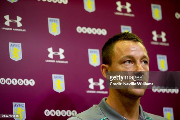 New signing John Terry of Aston Villa talks to the press during a press conference at Villa Park on July 03, 2017 in Birmingham, England.