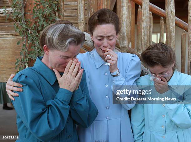 Women of the Fundamentalist Church of Jesus Christ of Latter Day Saints who were sent home without their children console one another at the Yearning...