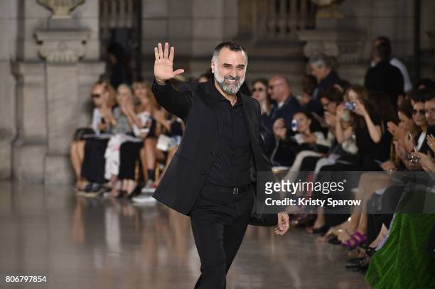 Designer Georges Hobeika acknowledges the audience during the Georges Hobeika Haute Couture Fall/Winter 2017-2018 show as part of Haute Couture Paris...