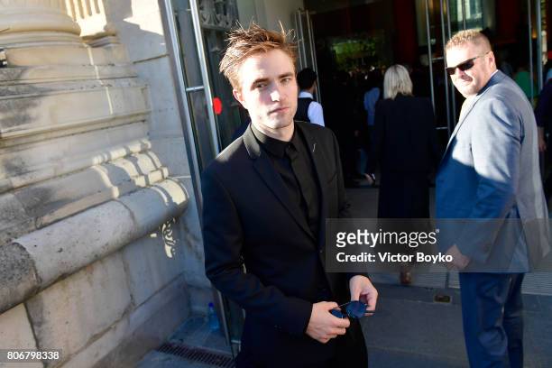 Robert Pattinson attends 'Christian Dior, couturier du reve' Exhibition Launch celebrating 70 years of creation at Loulou Club on July 3, 2017 in...