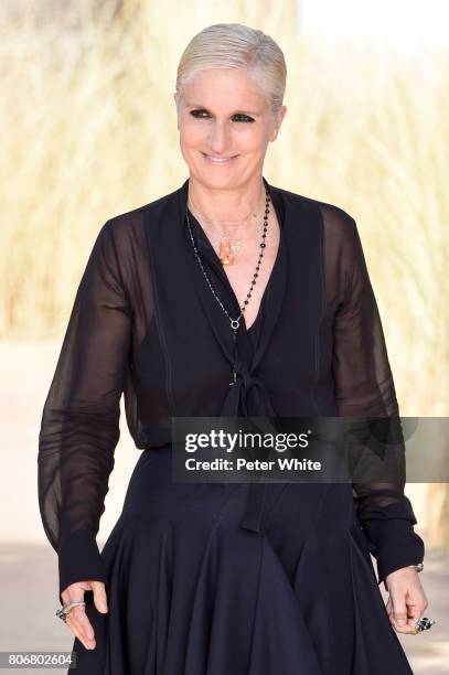 Maria Grazia Chiuri acknowledges the audience after the Christian Dior Haute Couture Fall/Winter 2017-2018 show as part of Haute Couture Paris...