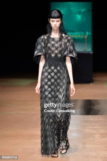 Model walks the runway at the Iris Van Herpen Autumn Winter 2017 fashion show during Paris Haute Couture Fashion Week on July 3, 2017 in Paris,...