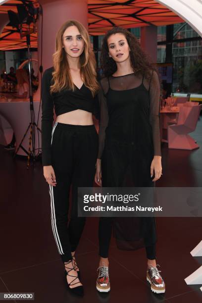 Anna Wilken and Betty Taube during the Marcell von Berlin 'Genesis' collection presentation on July 3, 2017 in Berlin, Germany.