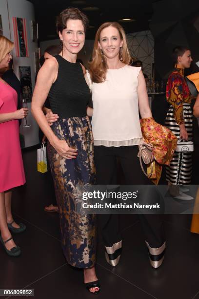 Julia Bremermann and Kristin Meyer are seen during the Marcell von Berlin 'Genesis' collection presentation on July 3, 2017 in Berlin, Germany.