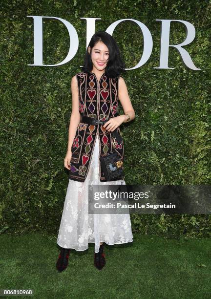 Guest attends 'Christian Dior, couturier du reve' Exhibition Launch celebrating 70 years of creation at Musee Des Arts Decoratifs on July 3, 2017 in...