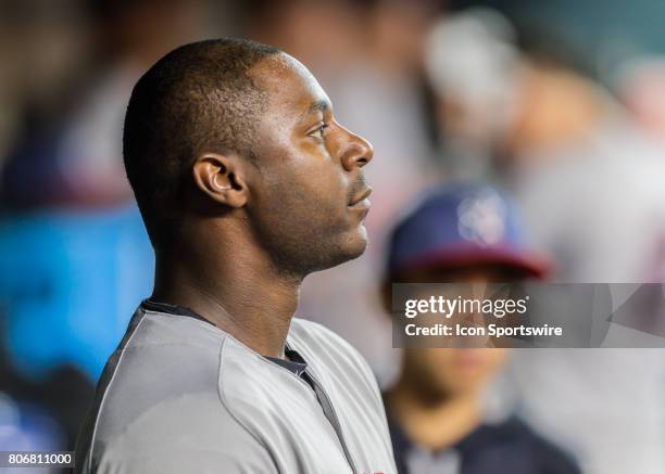 New York Yankees first baseman Chris Carter watches the game from the visitors' dugout during the MLB game between the New York Yankees and Houston...