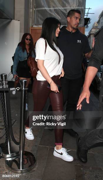 Kylie Jenner seen on a night out with boyfriend Travis Scott at Nobu Berkeley St restaurant on July 3, 2017 in London, England.