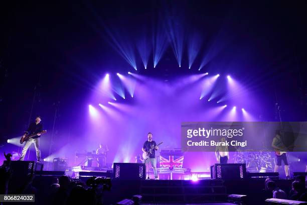 Dave Farrell, Mike Shinoda, Chester Bennington and Brad Delson of Linkin Park perform at The O2 Arena on July 3, 2017 in London, England.