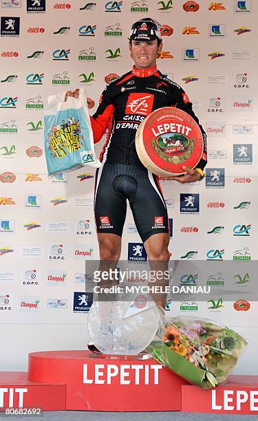 Spain's Alejandro Valverde poses on the podium, on April 15, 2008 in Vimoutiers, Normandy, western France, after winning the 69th edition of the...