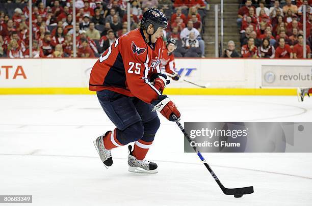 Viktor Kozlov of the Washington Capitals handles the puck against the Philadelphia Flyers during game one of the 2008 NHL Eastern Conference...