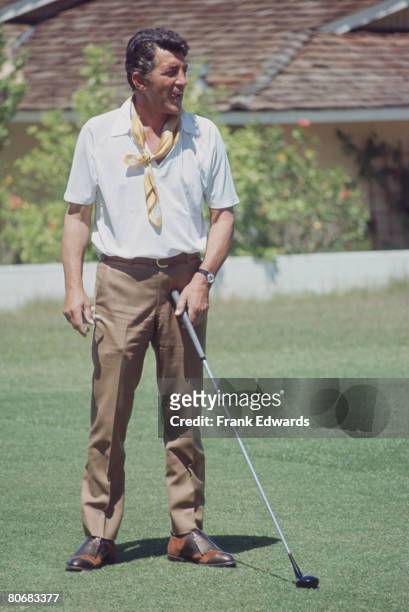 Actor and singer Dean Martin takes part in a Stars' Golf Tournament, April 1969.