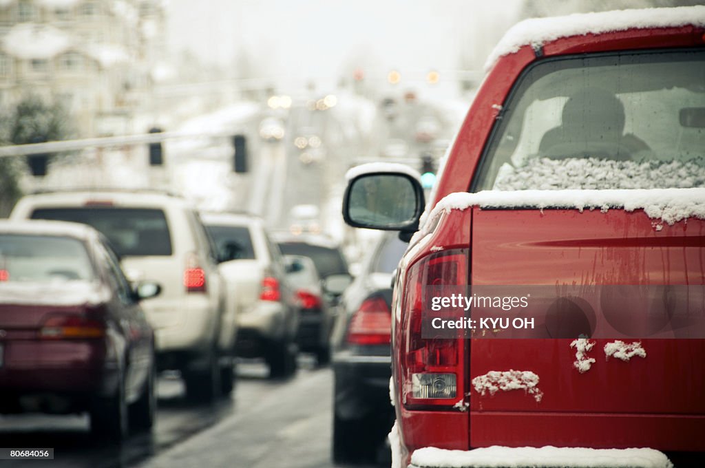 Snow on the road causing traffic