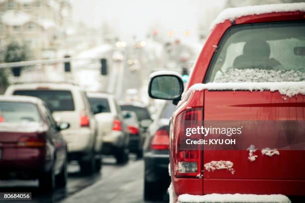 snow on the road causing traffic - trucks on queue stock pictures, royalty-free photos & images