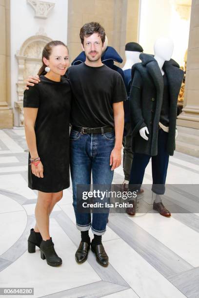 Young fashion designer and award winner Hannah Kliewer and fashion designer Michael Sontag during the European Fashion Award FASH at Bode Museum on...