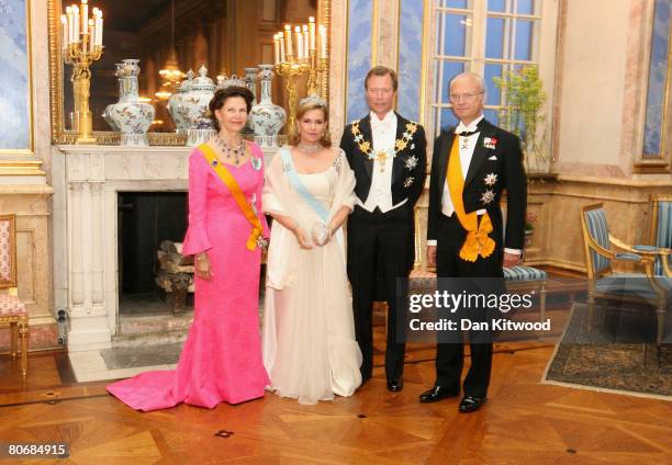 Queen Silvia of Sweden and King Carl XVI Gustaf welcomes Grand Duchess Maria Teresa and Grand Duke Henri of Luxembourg, to a state banquet at the...