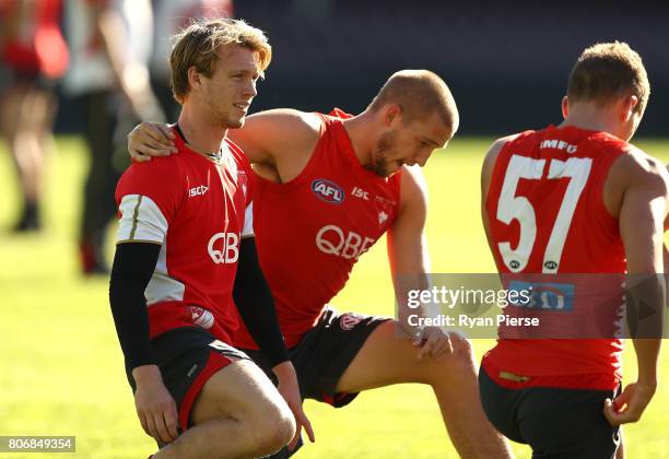 Callum Mills and Sam Reid of the Swans train during a Sydney Swans AFL training session at Sydney Cricket Ground on July 4, 2017 in Sydney, Australia.