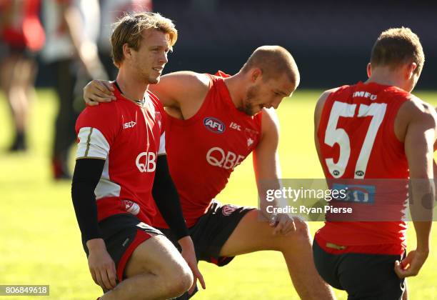 Callum Mills and Sam Reid of the Swans train during a Sydney Swans AFL training session at Sydney Cricket Ground on July 4, 2017 in Sydney, Australia.