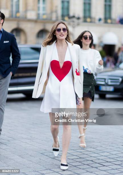 Olivia Palermo wearing a dress with hear print outside Schiaparelli during Paris Fashion Week - Haute Couture Fall/Winter 2017-2018 : Day Two on July...