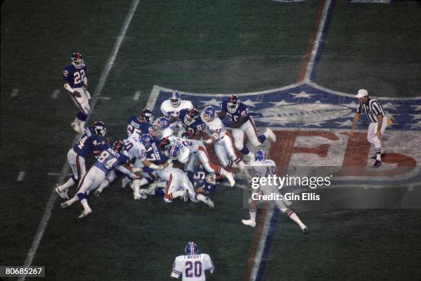 Jeff Rutledge Quarterback Jeff Rutledge of the New York Giants dives for a first ...