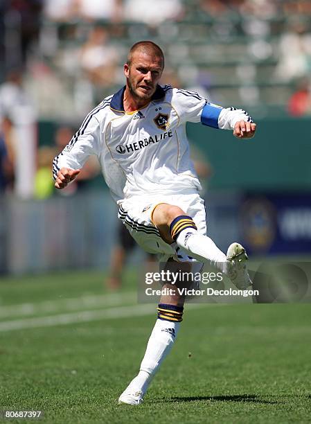 David Beckham of the Los Angeles Galaxy follows through on his kick from the right wing during their MLS game against Toronto FC at the Home Depot...