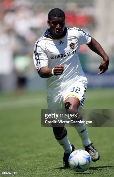 Brandon McDonald of the Los Angeles Galaxy paces the ball on the attack against Toronto FC during their MLS game at the Home Depot Center on April...
