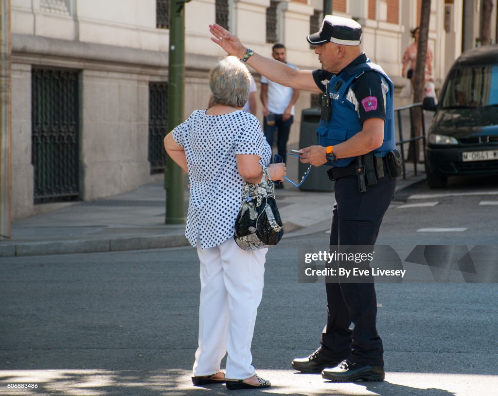 A Spanish Policeman giving directions