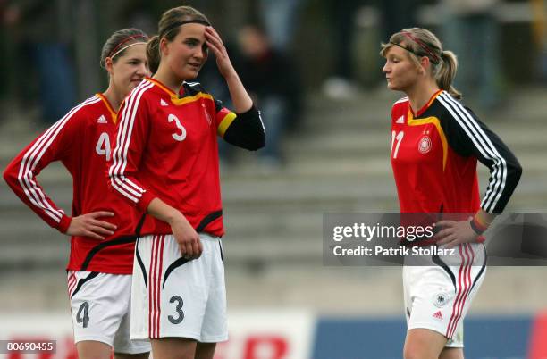 Inka Wesley , Valeria Kleiner and Alexandra Popp of Germany look on after the Women's U17 Euro qualifier match between Germany and Sweden at the "Am...