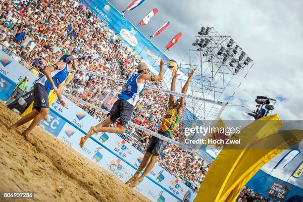 Daniele Lupo and Paolo Nicolai of Italy against Pedro Solberg Salgado and Gustavo Carvalhaesv of Brazil in action during the Swatch Beach Volleyball...