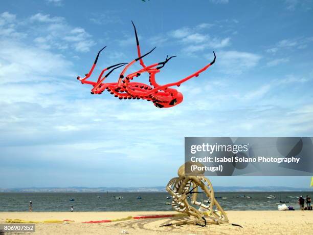 kite festival at alcochete beach, portugal - giant octopus stock pictures, royalty-free photos & images