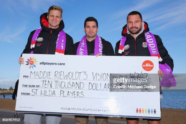 Nick Riewoldt Leigh Montagna and Jarryn Geary pose for the Maddie's Match St Kilda V Richmond during a St Kilda Saints AFL media opportunity at the...