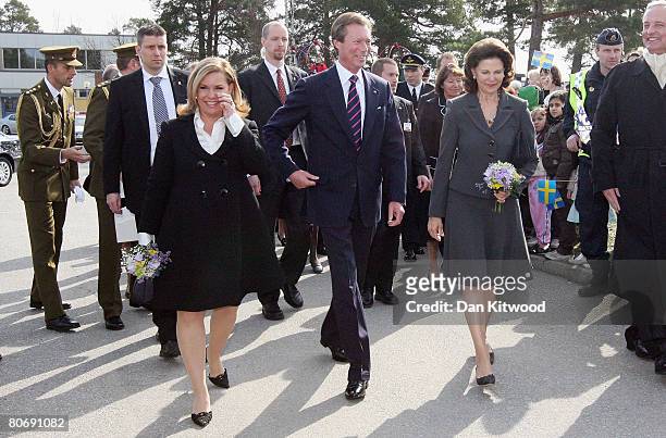 Grand Duchess Maria Teresa of Luxembourg and Grand Duke Henri of Luxembourg visit Tallbohovskolan, a school outside Stockholm with Queen Silvia of...