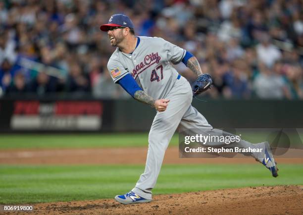 Reliever Peter Moylan of the Kansas City Royals delivers a pitch during the seventh inning of a game against the Seattle Mariners at Safeco Field on...