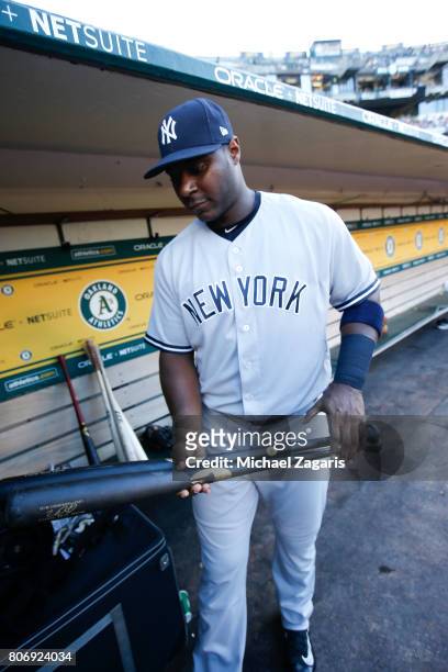 Chris Carter of the New York Yankees stands in the dugout prior to the game against the Oakland Athletics at the Oakland Alameda Coliseum on June 15,...