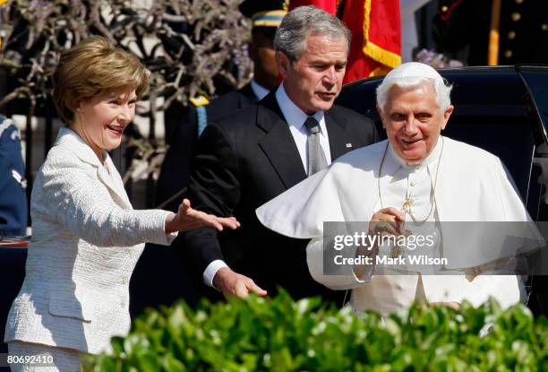 Pope Benedict XVI is welcomed by U.S. President George W. Bush and First Lady Laura Bush during an arrival ceremony on the South Lawn at the White...