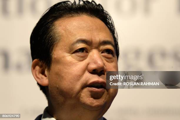 Meng Hongwei, president of Interpol, gives an addresses at the opening of the Interpol World Congress in Singapore on July 4, 2017. - The three-day...