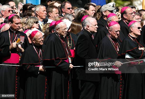 Members of the Catholic Church watch as Pope Benedict XVI speaks during an arrival ceremony on the South Lawn at the White House April 16, 2008 in...