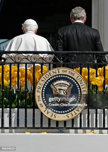 Pope Benedict XVI and U.S. President George W. Bush turn to go inside the White House after an arrival ceremony April 16, 2008 in Washington, DC....