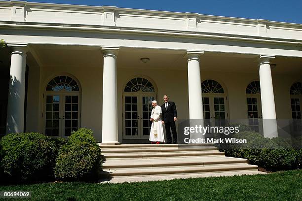 President George W. Bush and Pope Benedict XVI walk along the Colonnade after a arrival ceremony ceremony at the White House, April 16, 2008 in...