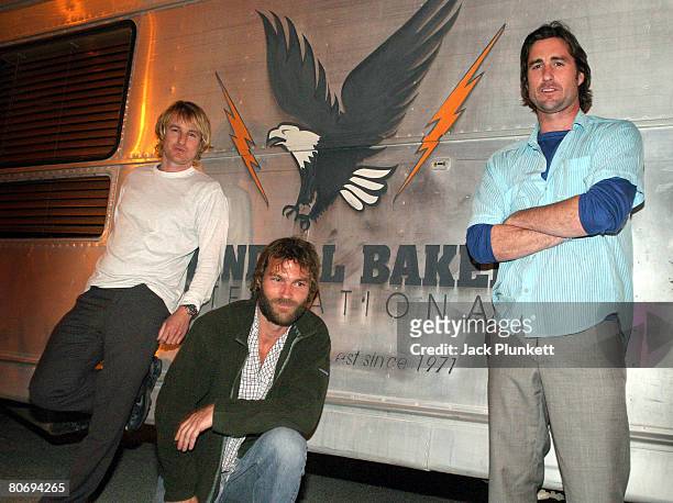 Actors Andrew Wilson, Luke Wilson, and Owen Wilson, r-l, stand by a trailer used in their new movie 'The Wendell Baker Story'