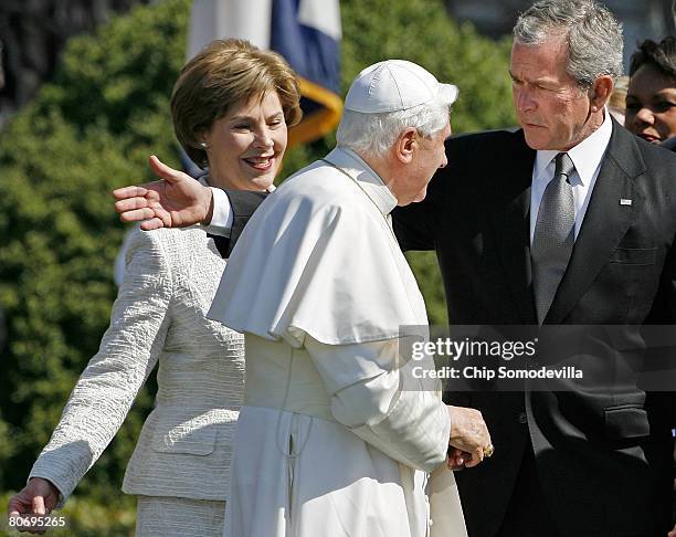 First lady Laura Bush and U.S. President George W. Bush welcome Pope Benedict XVI during an arrival ceremony on the South Lawn of the White House...