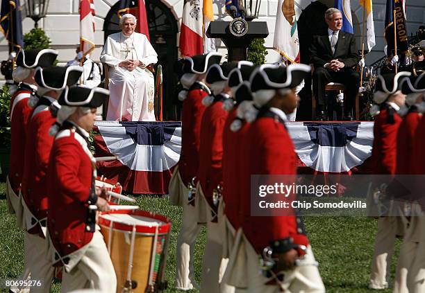 Pope Benedict XVI and U.S. President George W. Bush watch as Fife and Drum Corps perform during an arrival ceremony on the south lawn of the White...